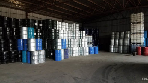 Warehouse with barrels containing raw materials for producing foam blowing agents in China