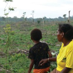 Manu Malak with his mother Maryodi, West Papua