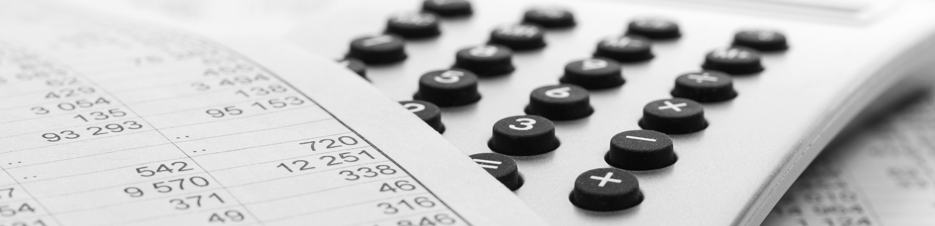 Image of a financial report and calculator